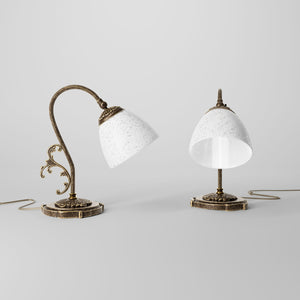 Art Nouveau brass table lamp with a spotted white glass shade and adjustable joint, ideal for elegant spaces by Ghidini 1849 - Finish: OAS Antique Brass
