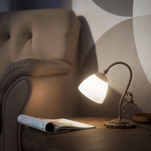 Art Nouveau brass table lamp with a spotted white glass shade and adjustable joint, ideal for elegant spaces by Ghidini 1849 - Finish: OAS Antique Brass