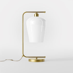 Table lamp with brass arm and white glass shade, elegant design for sophisticated interiors by Ghidini 1849 - Finish: OBV Bronze Satin Light Brass
