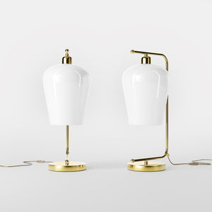 Table lamp with brass arm and white glass shade, elegant design for sophisticated interiors by Ghidini 1849 - Finish: OLV Polished Brass