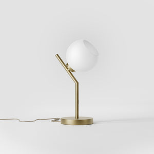 Brass table lamp with opal glass globe, inclined geometric design, ideal for modern and refined interiors by Ghidini 1849 - Finish: OBV Bronze Satin Light Brass