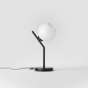 Brass table lamp with opal glass globe, inclined geometric design, ideal for modern and refined interiors by Ghidini 1849 - Finish: ONO Matt Black