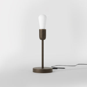 Modern brass table lamp with stem, minimalist and elegant design, ideal for desks, bedside tables, and consoles by Ghidini 1849 - Finish: OBM Bronze Satin Matt Brass