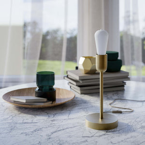 Modern brass table lamp with stem, minimalist and elegant design, ideal for desks, bedside tables, and consoles by Ghidini 1849 - Finish: OBV Bronze Satin Light Brass