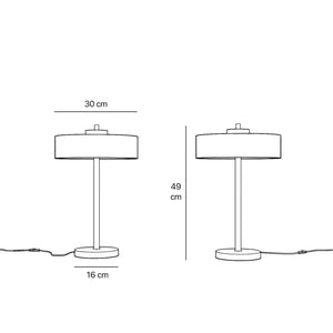Modern metal table lamp with a matte black shade and golden interior, perfect for stylish interiors by Ghidini 1849