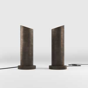 Brass table lamp with a sleek cylindrical shape and circular base, ideal for contemporary and elegant interiors by Ghidini 1849 - Finish: OBM Bronze Satin Matt Brass