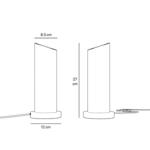 Brass table lamp with a sleek cylindrical shape and circular base, ideal for contemporary and elegant interiors by Ghidini 1849