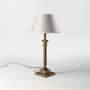 Classic brass table lamp with an ivory fabric shade, featuring an ornate column base, ideal for living rooms or office spaces by Ghidini 1849 - Finish: OAS Antique Brass