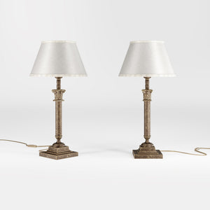 Classic brass table lamp with an ivory fabric shade, featuring an ornate column base, ideal for living rooms or office spaces by Ghidini 1849 - Finish: OAS Antique Brass