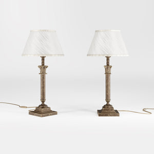 Classic brass table lamp with an ivory fabric shade, featuring an ornate column base, ideal for living rooms or office spaces by Ghidini 1849 - Finish: OAS Antique Brass