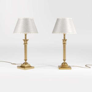 Classic brass table lamp with an ivory fabric shade, featuring an ornate column base, ideal for living rooms or office spaces by Ghidini 1849 - Finish: OBS Bronze Satin Brass