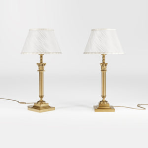 Classic brass table lamp with an ivory fabric shade, featuring an ornate column base, ideal for living rooms or office spaces by Ghidini 1849 - Finish: OBS Bronze Satin Brass