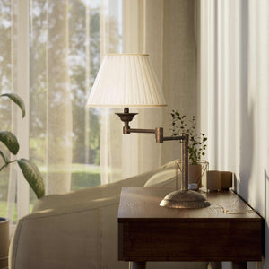 Table lamp with double adjustable arm, ivory pleated fabric shade and circular base - Finish: OAS Antique Brass