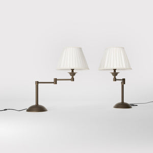 Table lamp with double adjustable arm, ivory pleated fabric shade and circular base - Finish: OBM Bronze Satin Matt Brass
