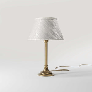 Brass table lamp with an ivory striped fabric shade, Made in Italy, timeless design by Ghidini 1849