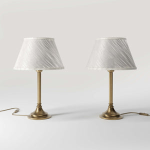 Brass table lamp with an ivory striped fabric shade, Made in Italy, timeless design by Ghidini 1849