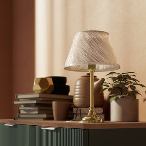 Brass table lamp with an ivory striped fabric shade, Made in Italy, timeless design by Ghidini 1849