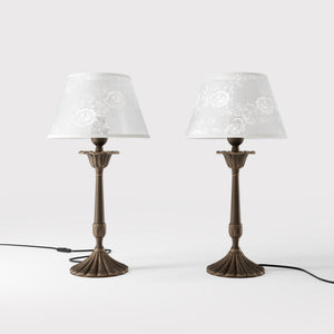Classic brass table lamp with white fabric shade decorated with floral patterns, sculpted base with decorative elements by Ghidini 1849 - Finish: OBM Bronze Satin Matt Brass