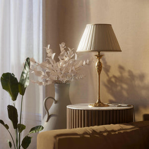 Liberty style table lamp Simona collection with decorated brass base featuring floral motifs and pleated ivory white fabric lampshade by Ghidini 1849 - Finish: OBS Bronze Satin Brass