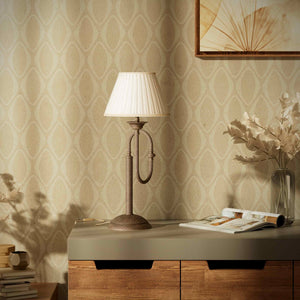 Brass table lamp with trombone-style design, ivory pleated shade, adjustable arm and decorated base, musical design Made in Italy by Ghidini 1849 - Finish: OAS Antique Brass