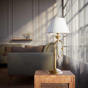 Brass table lamp with trombone-style design, ivory pleated shade, adjustable arm and decorated base, musical design Made in Italy by Ghidini 1849 - Finish: OBS Bronze Satin Brass