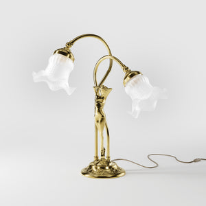 Art Nouveau table lamp in brass with sculptural female figure and two wavy frosted glass shades, decorated base by Ghidini 1849 - Finish: OLV Polished Brass