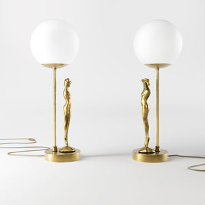Brass table lamp with sculpted female figure and frosted glass globe, ideal for elegant interiors by Ghidini 1849 - Finish: OBS Bronze Satin Brass