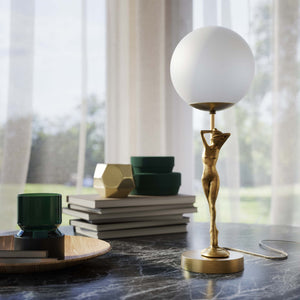 Brass table lamp with sculpted female figure and frosted glass globe, ideal for elegant interiors by Ghidini 1849 - Finish: OBS Bronze Satin Brass