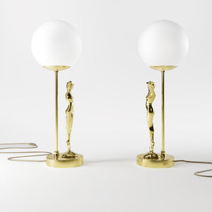 Brass table lamp with sculpted female figure and frosted glass globe, ideal for elegant interiors by Ghidini 1849 - Finish: OLV Polished Brass