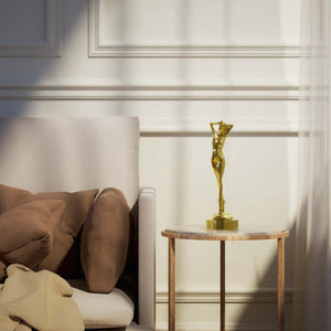 Art Deco decorative statue with dancing brass female figure, elegant pose and minimalist circular base by Ghidini 1849 - Finish: OLV Polished Brass