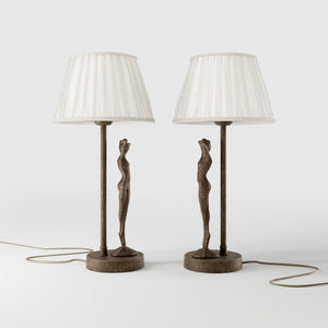 Art Deco table lamp with dancing brass female figure and pleated ivory fabric shade, essential circular base by Ghidini 1849 - Finish: OAS Antique Brass