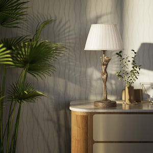 Art Deco table lamp with dancing brass female figure and pleated ivory fabric shade, essential circular base by Ghidini 1849 - Finish: OAS Antique Brass