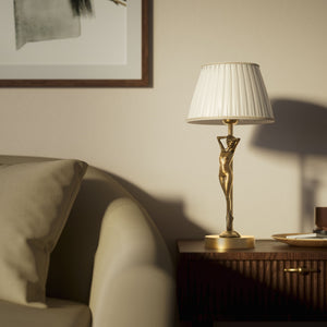Art Deco table lamp with dancing brass female figure and pleated ivory fabric shade, essential circular base by Ghidini 1849 - Finish: OBS Bronze Satin Brass