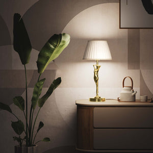 Art Deco table lamp with dancing brass female figure and pleated ivory fabric shade, essential circular base by Ghidini 1849 - Finish: OLV Polished Brass