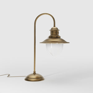 Brass table lamp with curved arm and glass diffuser, Italian design inspired by historic marine lanterns by Ghidini 1849 - Finish: OBS Bronze Satin Brass