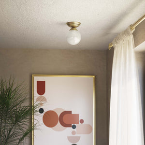 Classic ceiling light with glossy white glass globe and circular brass base elegant Italian design interior lighting by Ghidini 1849 - Finish: OBV Bronze Satin Light Brass