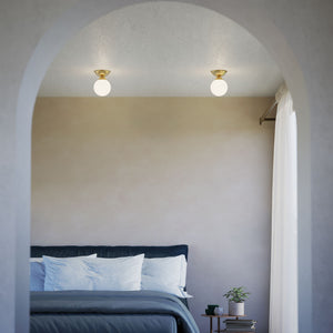 Classic ceiling light with glossy white glass globe and circular brass base elegant Italian design interior lighting by Ghidini 1849 - Finish: OLV Polished Brass