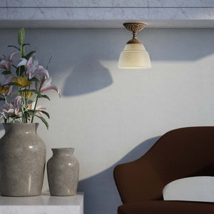 Art Nouveau brass ceiling lamp with floral decorated canopy and bell-shaped frosted glass diffuser with diamond pattern by Ghidini 1849 - Finish: OAS Antique Brass