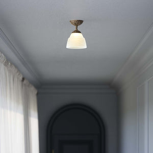 Art Nouveau brass ceiling lamp with floral decorated canopy and bell-shaped frosted glass diffuser with diamond pattern by Ghidini 1849 - Finish: OAS Antique Brass