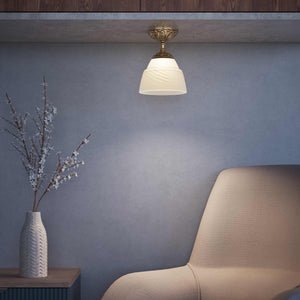 Art Nouveau brass ceiling lamp with floral decorated canopy and bell-shaped frosted glass diffuser with diamond pattern by Ghidini 1849 - Finish: OBS Bronze Satin Brass