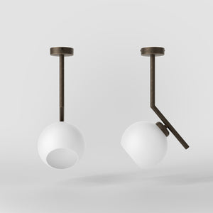 Brass ceiling light with a 16 cm opal glass sphere, soft lighting, ideal for modern and elegant interiors by Ghidini 1849 - Finish: OBM Bronze Satin Matt Brass