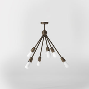 Modern brass chandelier with radial arms, elegant design, ideal for living rooms, lofts, and dining spaces by Ghidini 1849 - Finish: OBM Bronze Satin Matt Brass