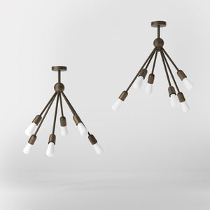 Modern brass chandelier with radial arms, elegant design, ideal for living rooms, lofts, and dining spaces by Ghidini 1849 - Finish: OBM Bronze Satin Matt Brass