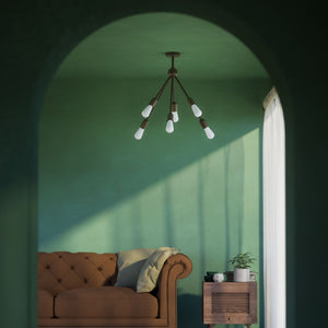 Modern brass chandelier with radial arms, elegant design, ideal for living rooms, lofts, and dining spaces by Ghidini 1849 - Finish: OBM Bronze Satin Matt Brass