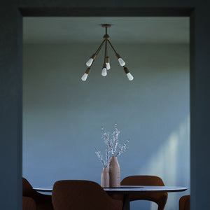 Modern brass chandelier with radial arms, elegant design, ideal for living rooms, lofts, and dining spaces by Ghidini 1849 - Finish: OBM Bronze Satin Matt Brass