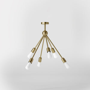 Modern brass chandelier with radial arms, elegant design, ideal for living rooms, lofts, and dining spaces by Ghidini 1849 - Finish: OBV Bronze Satin Light Brass