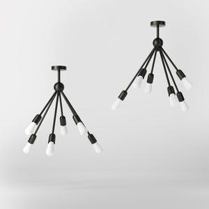 Modern brass chandelier with radial arms, elegant design, ideal for living rooms, lofts, and dining spaces by Ghidini 1849 - Finish: ONO Matt Black