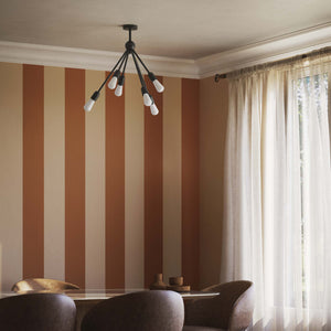 Modern brass chandelier with radial arms, elegant design, ideal for living rooms, lofts, and dining spaces by Ghidini 1849 - Finish: ONO Matt Black