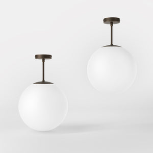 Minimalist globe ceiling light with frosted glass sphere and compact brass structure Made in Italy design by Ghidini 1849 - Finish: OBM Bronze Satin Matt Brass