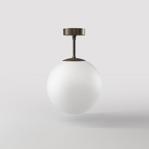 Brass ceiling light with opal glass globe, minimalist and elegant design for sophisticated interiors by Ghidini 1849 - Finish: OBM Bronze Satin Matt Brass